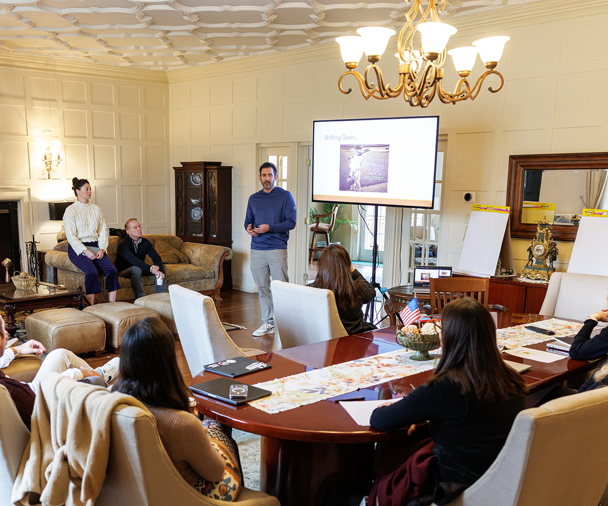 sport psychologist leading team mental performance consulting session